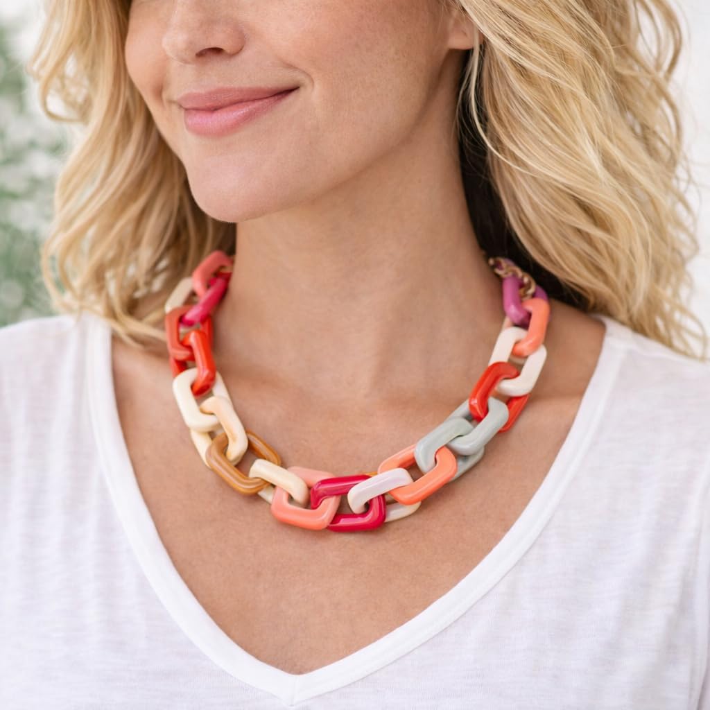 Bold chain link statement necklace worn on model