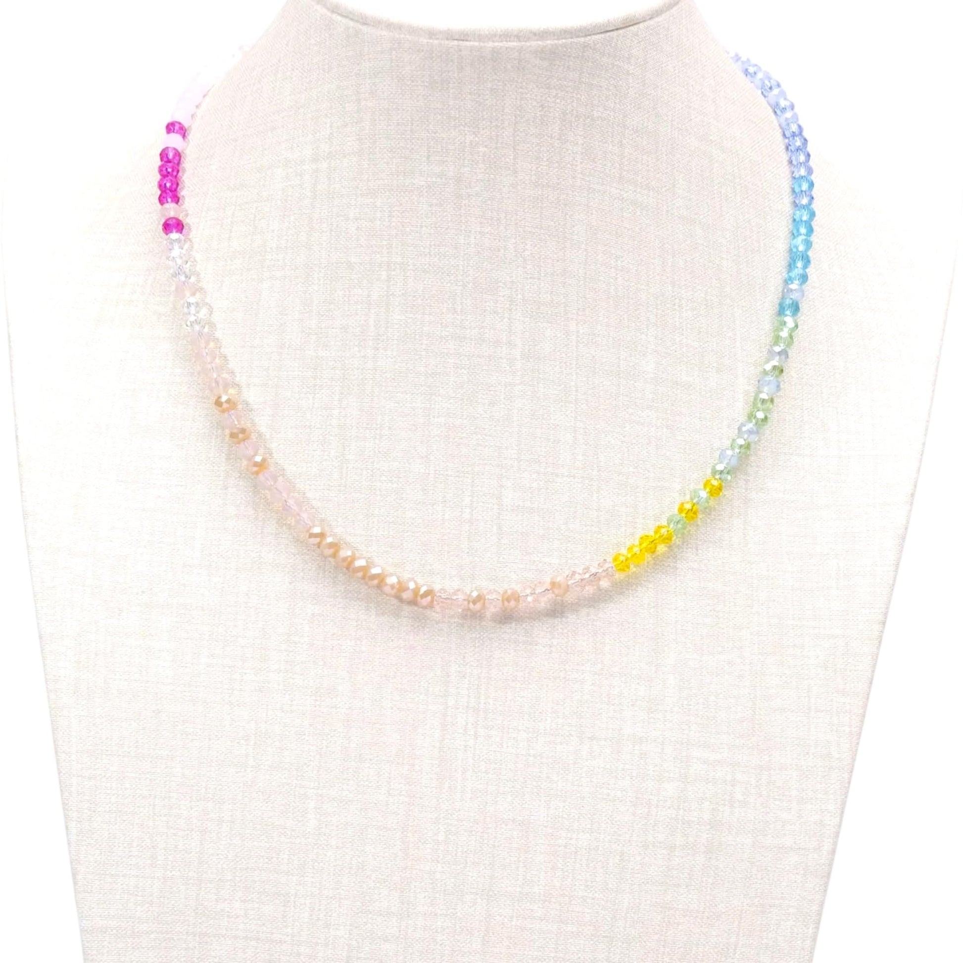 Tiny bead necklace flat lay showing full chain length