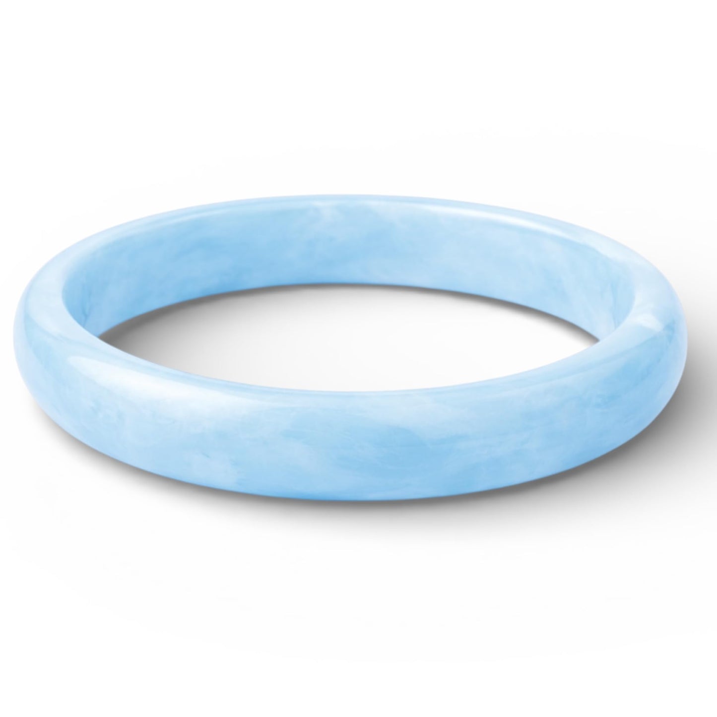 Blue ombre bangle set flat lay on white background