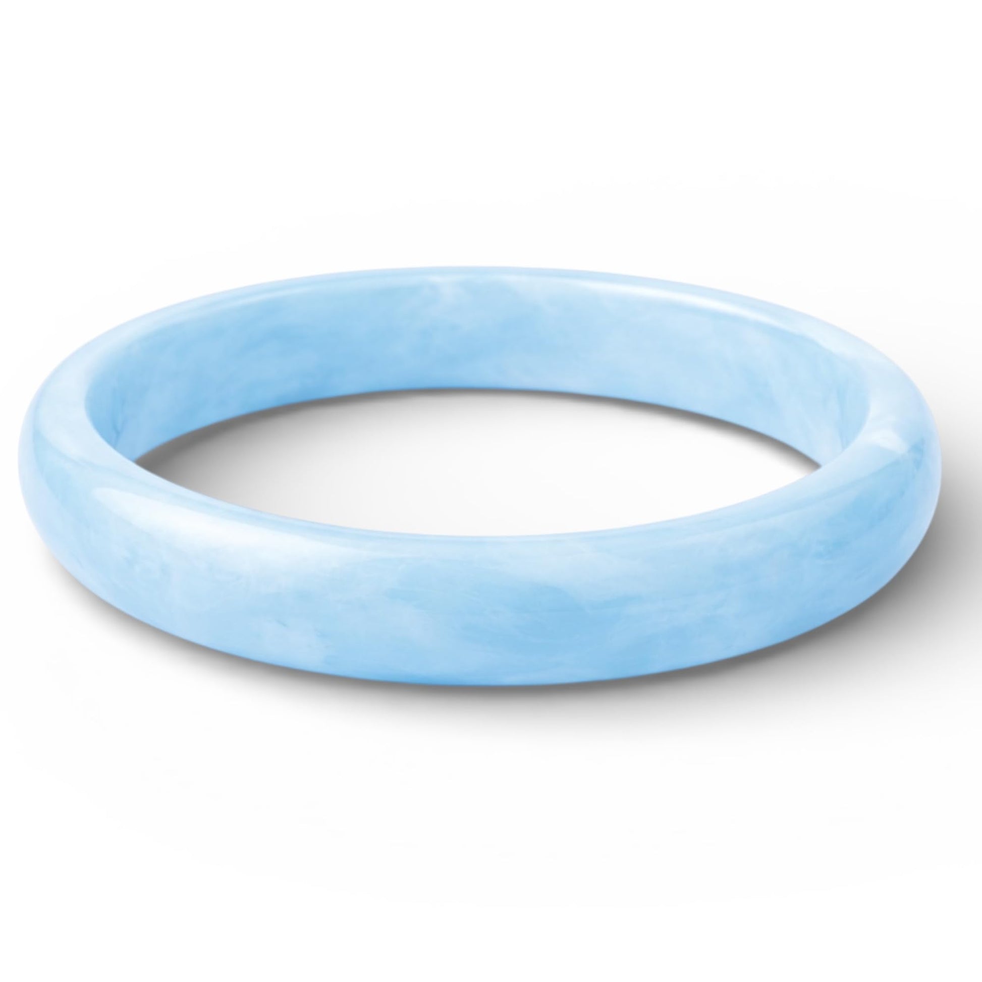 Blue ombre bangle set flat lay on white background